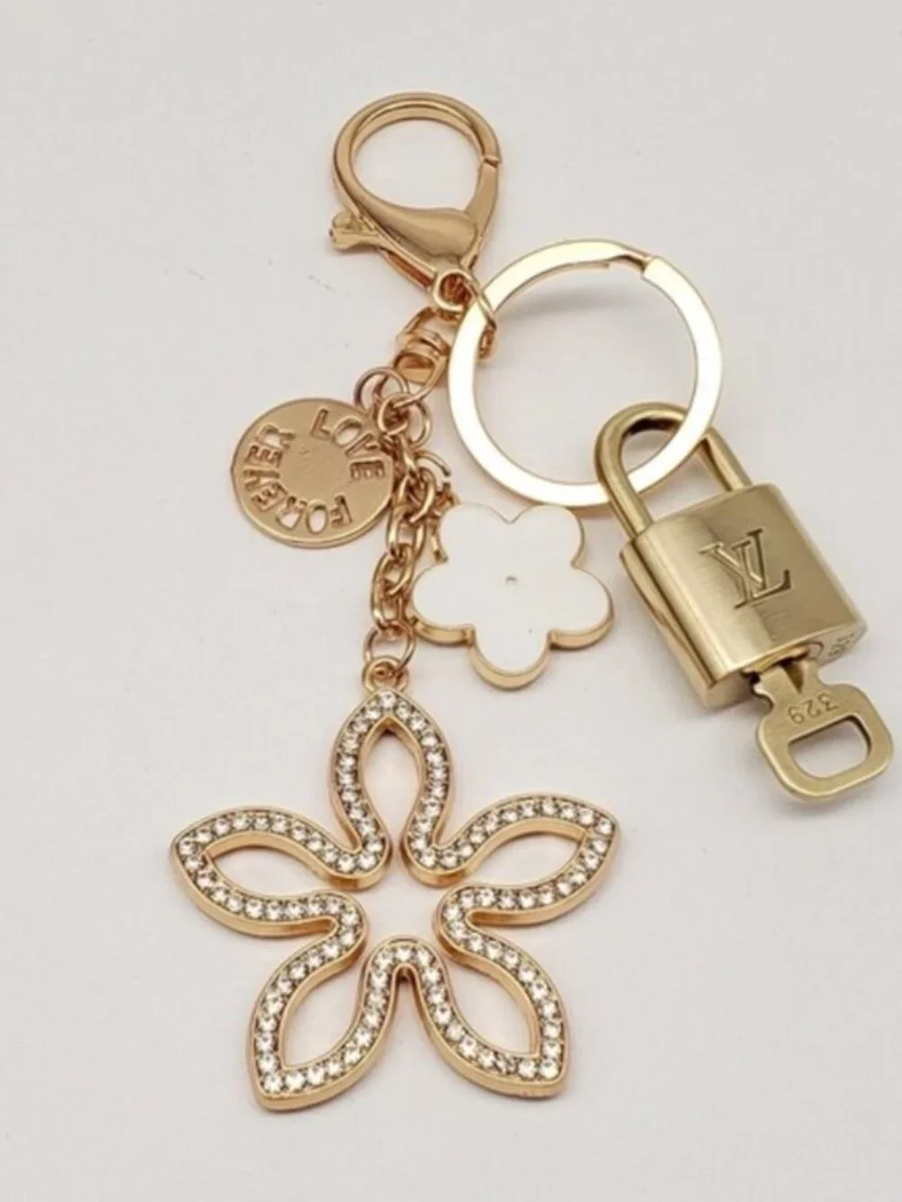 Authentic Louis Vuitton Gold Lock & Key 🔑 Bag Charm w/ Unbranded Clover Charm